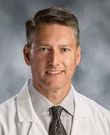 Thomas A Mladsi, MD