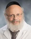 Jesse C Krakauer, MD