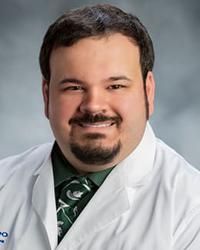 Joel M Szela