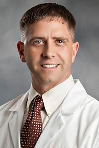 Robert E Poley, MD