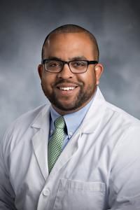 Carlo E Adams I, MD