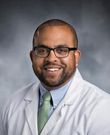 Carlo E Adams I, MD
