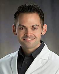 Justin K Skrzynski