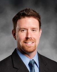 Adam J Farrell