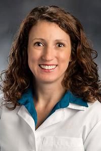 Julie M Surhigh, MD