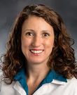 Julie M Surhigh, MD