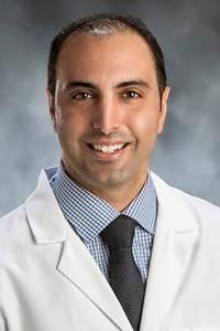 Revark D Kammo, MD