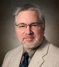 Albert S Cornelius, MD