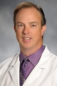 Christopher J Whitty, MD