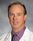 Christopher J Whitty, MD