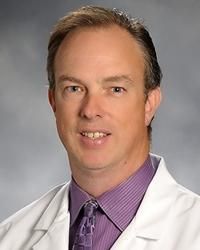 Christopher J Whitty