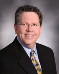 Curtis L McMann