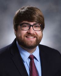 Adrian J Ptacek