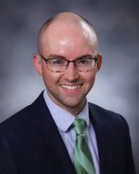 Carl J Baker