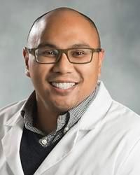 Kristopher J Patnugot