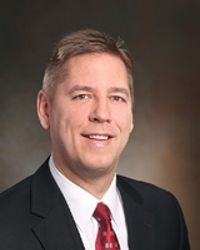 Keith J Postma
