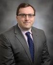 James R Polega, MD