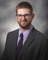 Adam J Martin