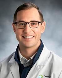 Christopher A Haltigin, MD