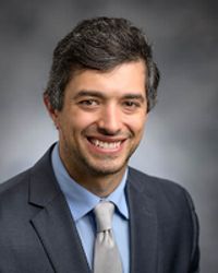 John P Rizik