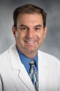 Jay E Fisher, MD