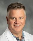 Joel E Buchanan, MD