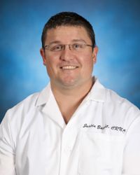Justin L Baecht