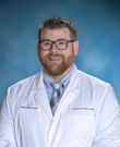 Andrew F Poulos, MD