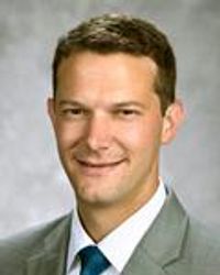 Adam J Reid