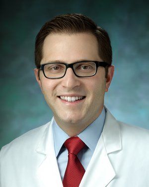 Justin Caplan, MD