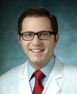 Justin Caplan, MD