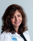 Lela Caros, MD