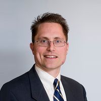 Andrew L Lundquist
