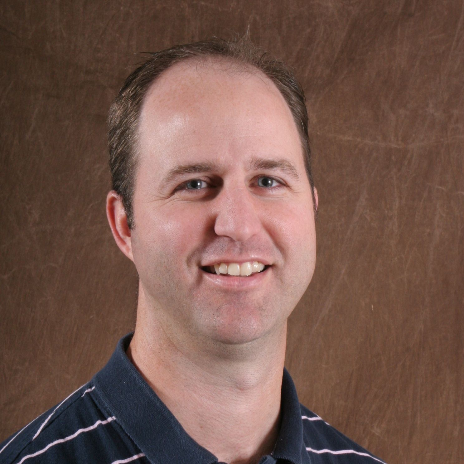Dustin L. Adams, NP