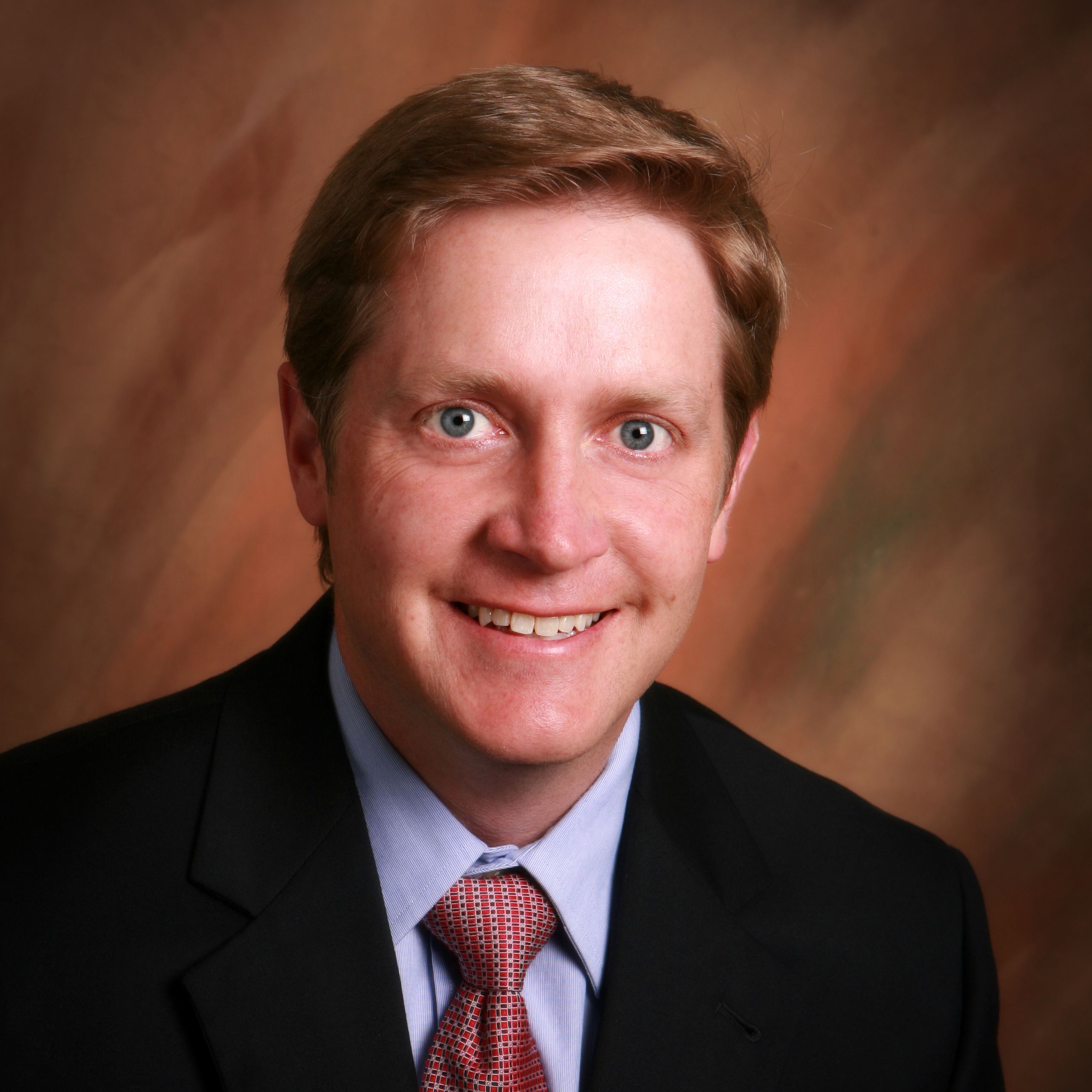 John E. Robison, MD
