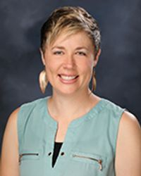 Courtney E. Dean