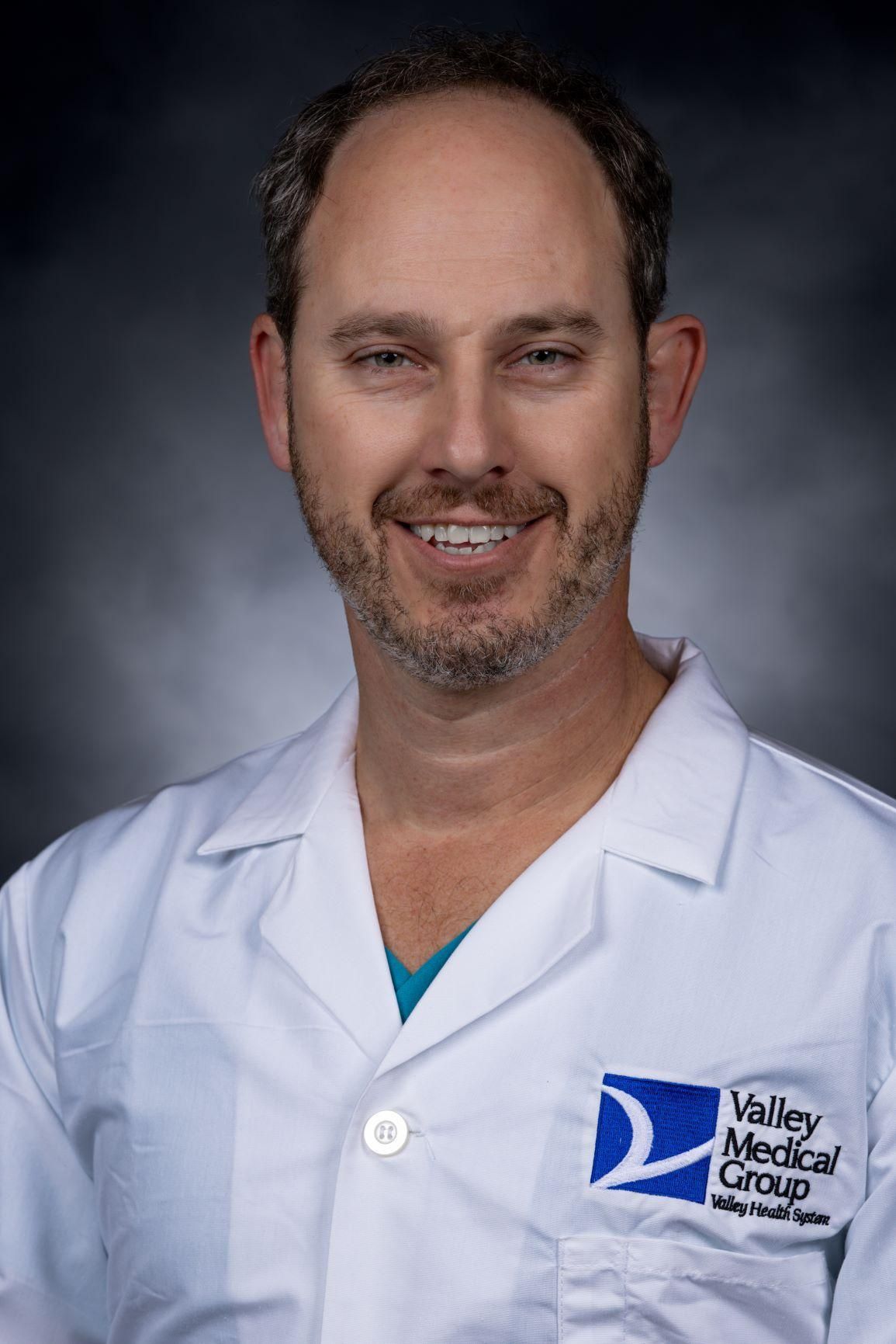 Steven E. Miller, MD
