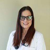 Tausha M Rhoades