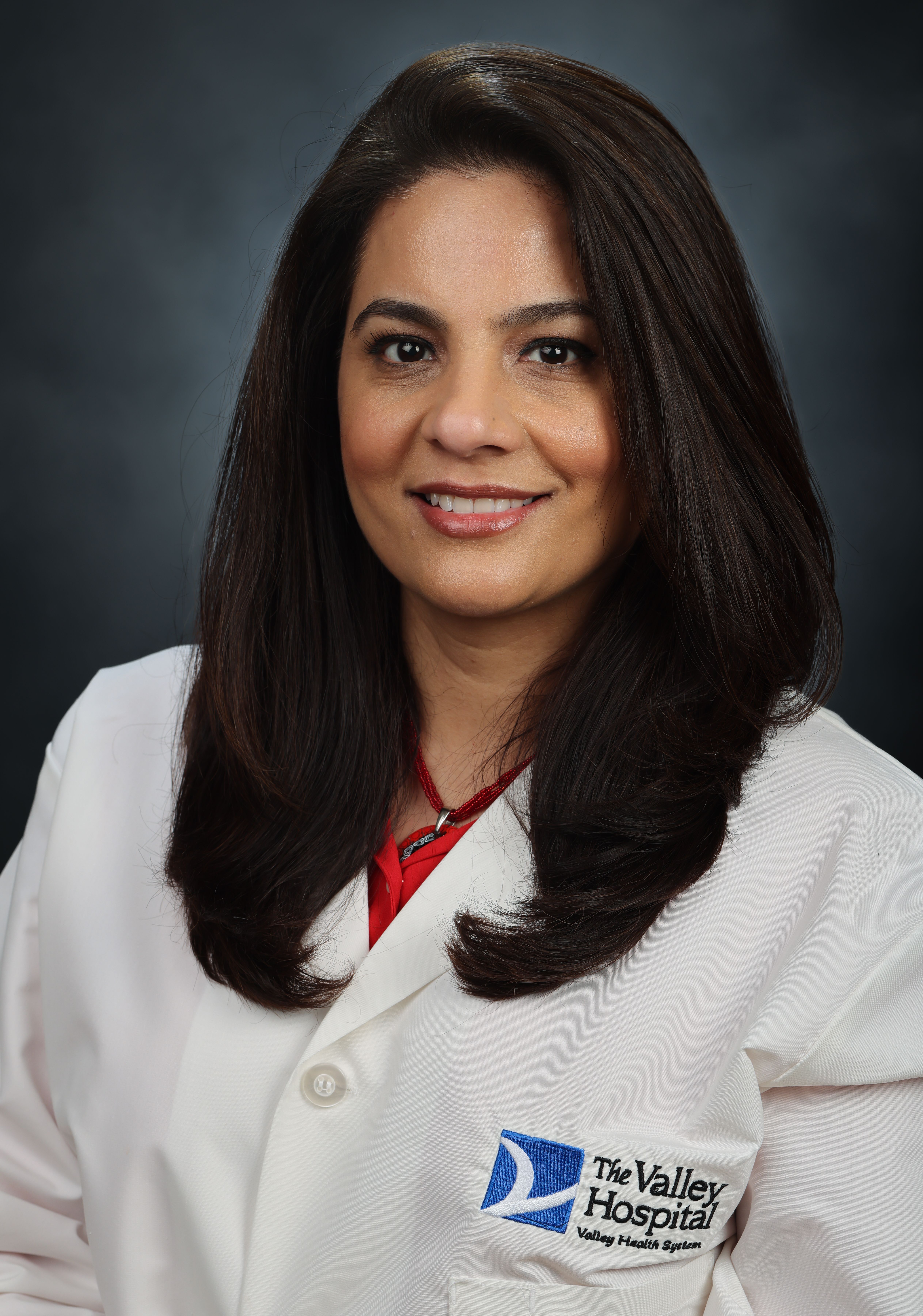 Uzma Parvez, MD